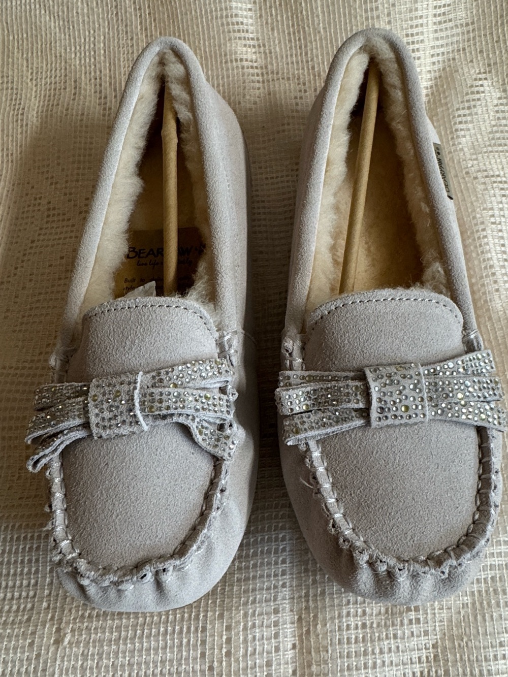 NWT. BearPaw Gray Suede Moccasin with Sheepskin Wool + Rhinestone Bow.Size 10